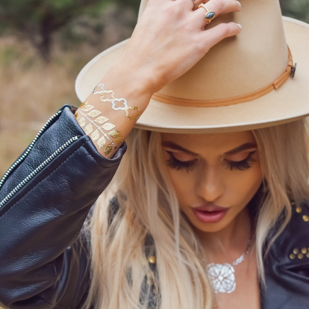 Adorn yourself in the metallic gold, silver and black temporary tattoos of the Sofia collection! Perfect to where anywhere from music festivals to Sunday brunch!