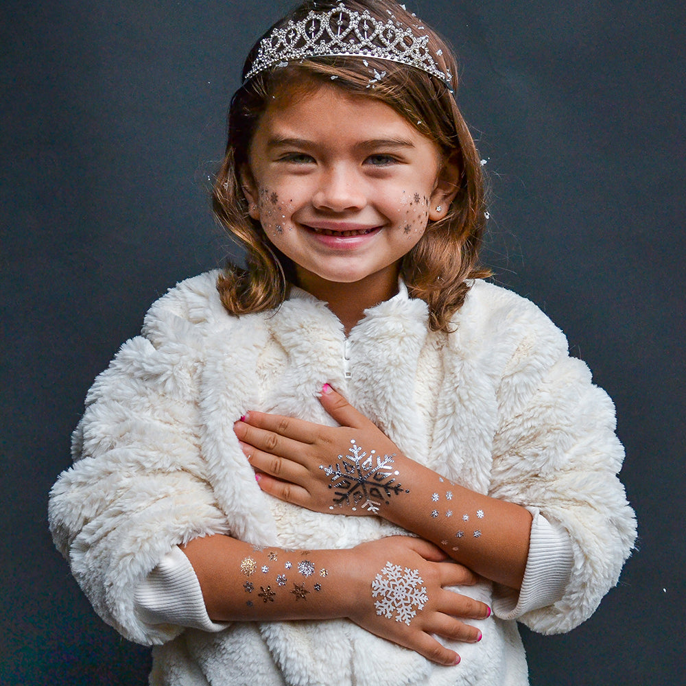 Loving the 'Winter Wonderland Variety Set' featuring 25 assorted snowflake tattoos: snowflake eye jewel, snowflake flurry, white frost, snowflake freckles and metallic silver snowflake. @FlashTattoos #FLASHTAT