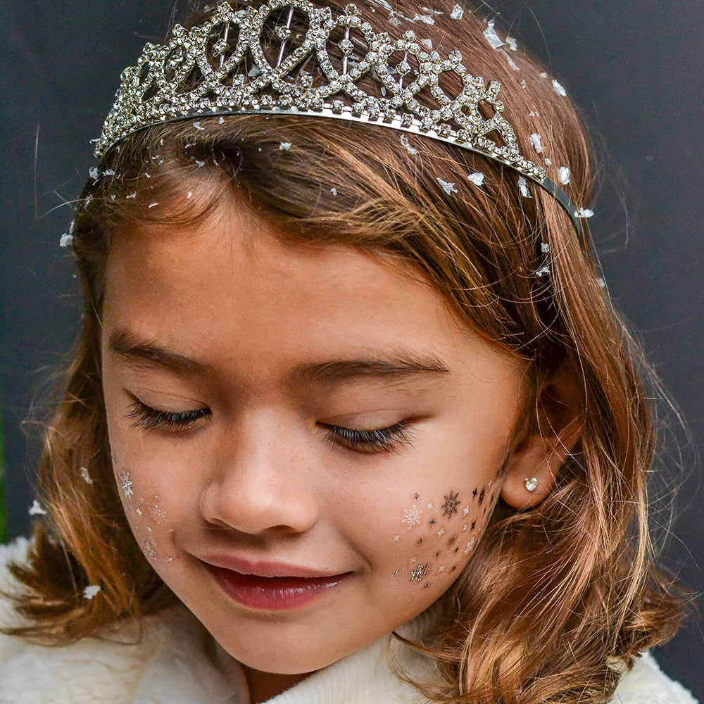 Adorn your cheeks in the Snowflake Eye Jewel , the perfect frozen inspired tattoo. @FlashTattoos #FLASHTAT