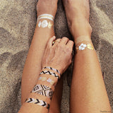 Layer the metallic bands of the Goldfish Kiss H2O collection as bracelets, armbands or anklets! Pair with your favorite bikini for an ultra glam look!