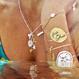 Flash Tattoos x Goldfish Kiss H2O collection - over 40 waterproof tattoos to add bling to all your island adventures from dawn to dusk!