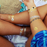 Inspired by the tropics, the Goldfish Kiss H2O collection features over 40 waterproof temporary tattoos