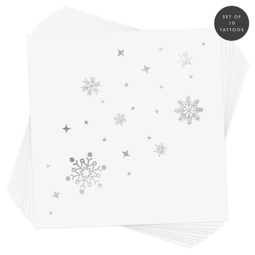 Set of 10 metallic silver snowflake temporary tattoos. The perfect holiday sparkle! @FlashTattoos