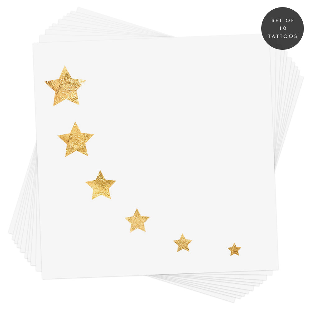 Set of 10 Gold Metallic stars in an arc from larger to smaller