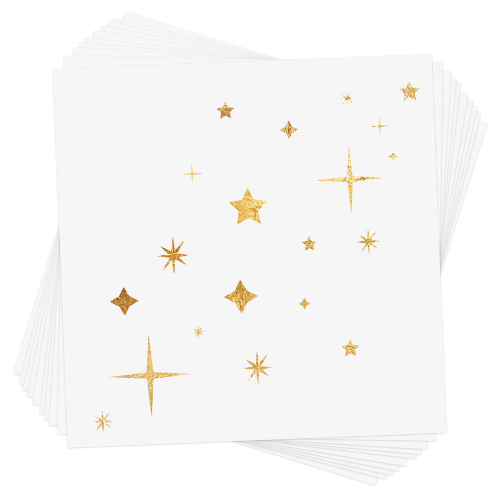 Adorn your eyes for dazzling metallic festive sparkle and shine. Twinkle and shine metallic gold star tattoos. @FlashTattoos #FLASHTAT