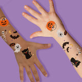 Cute N Spooky variety set featuring 25 pre-cut Halloween temporary tattoos - bats, cat, pumpkin, skeleton, ghost, trick or treat