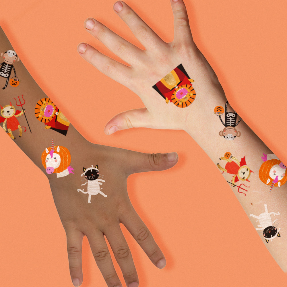 The Spooky Animals variety set features 25 assorted kids Halloween temporary tattoos in five festive designs: vampire lion, unicorn pumpkin, mummy cat, skeleton monkey and devil sloth.