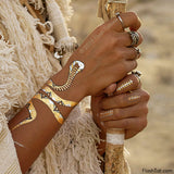 Flash your wild side with the Desert Dweller collection by Flash Tattoos! Create an exotic look by wrapping the cobra around your wrist!