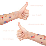 Flash Tattoos USA pack features 52 red blue and metallic silver tattoos. Easy to apply, lasts up to 6 days and fun for all ages!