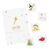 Set of metallic temporary tattoos featuring a witch hat and broom, rainbow over a yellow brick road, red ruby slippers, pink and evil witches, and a princess wand.