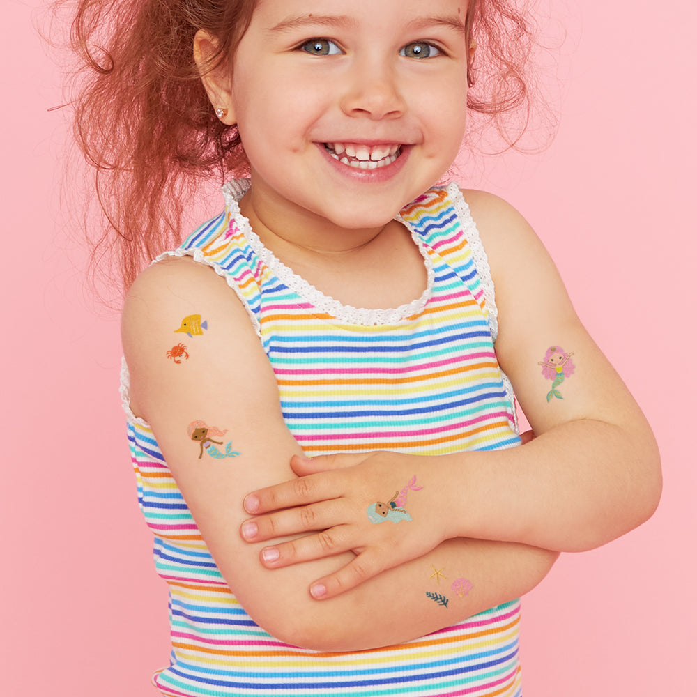 Mermaid Lagoon tattoo set features 25 under the sea inspired kids tattoos in 5 assorted designs - the perfect mermaid party favors!