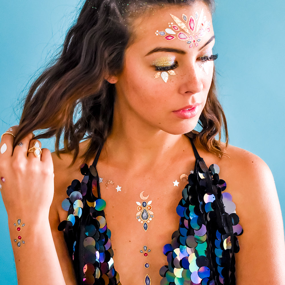 Dance the night away while shimmering from head to toe in the Aurora collection. A shimmering cosmic pack featuring over 30 mystical tattoos!