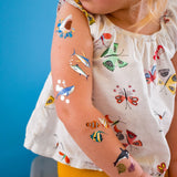 Party like an ocean explorer in the 'Under the Sea Variety Set' with five assorted tattoo designs: great white shark, fish, blue whale, orca and marlin