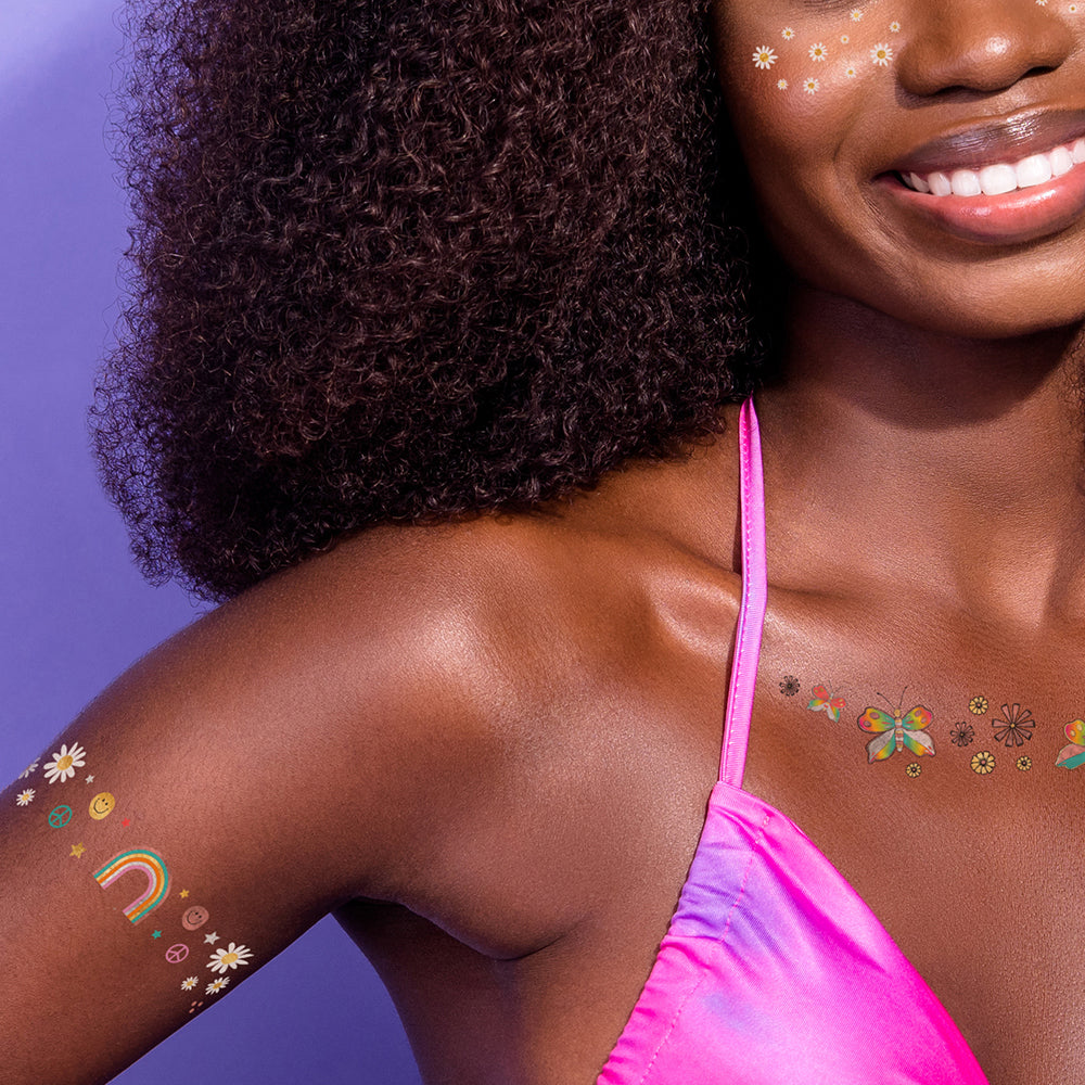  Adorn your body in the Daisy Dreamer pack featuring rainbows, smileys, daisies, stars, peace signs, bolts and flourishes. @FlashTattoos