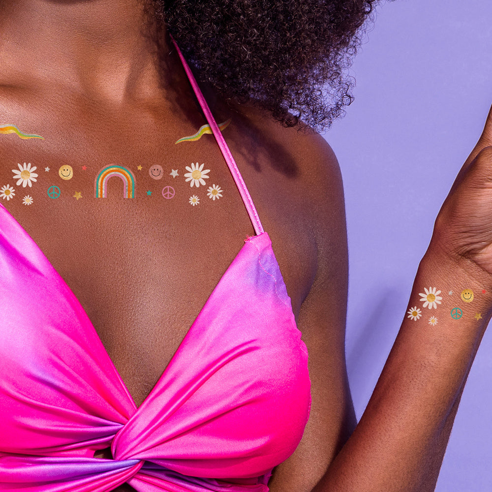 Flash Tattoos Daisy Dreamer pack features over 40 assorted designs including freckles, daisies, butterflies, flowers, eye, stars and a daisy-filled colorful flourish.