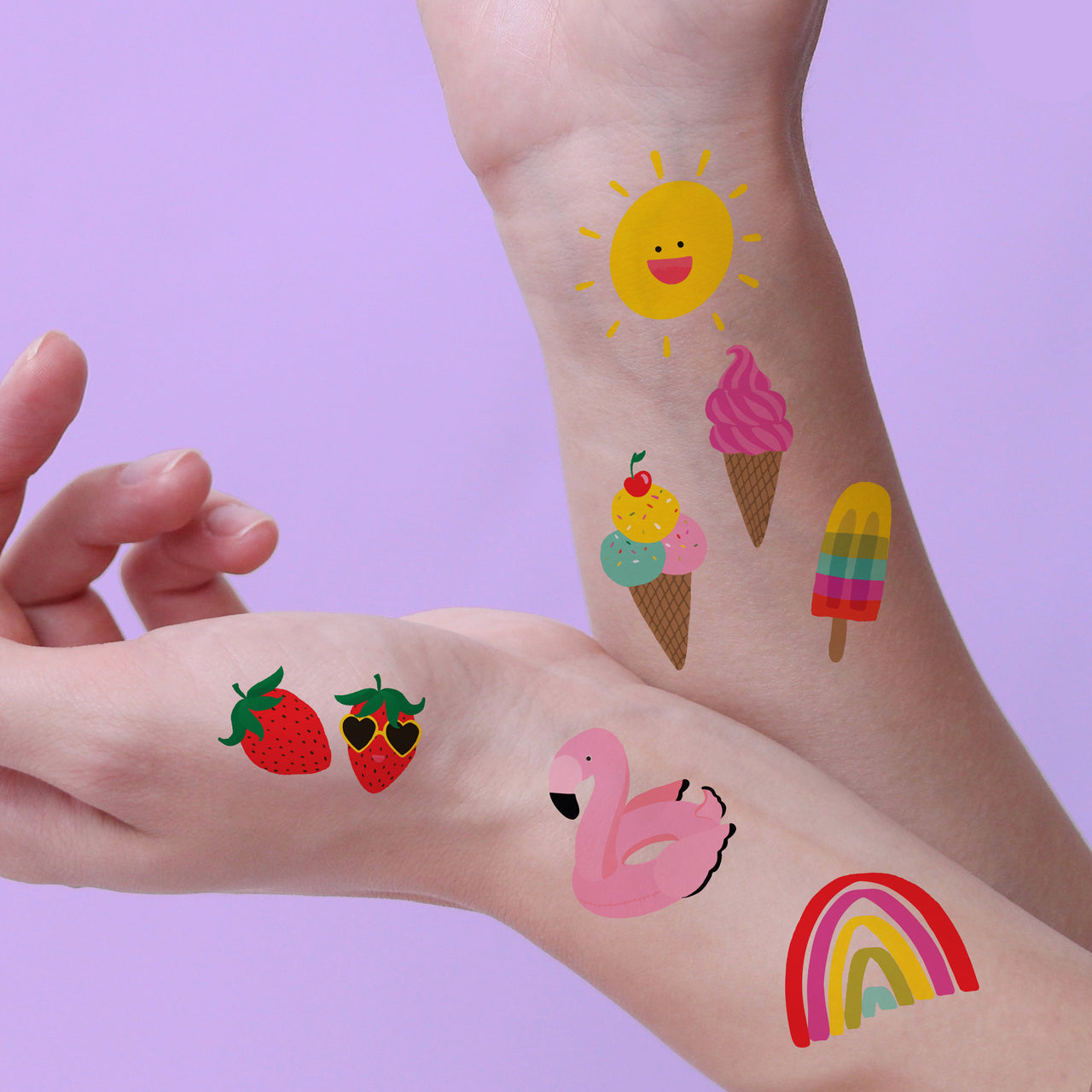 Summer Fun Variety set features 25 assorted summer inspired colorful tattoos: flamingo, gold palm tree, strawberries, popsicles, ice cream, flamingo float, sun and rainbow.