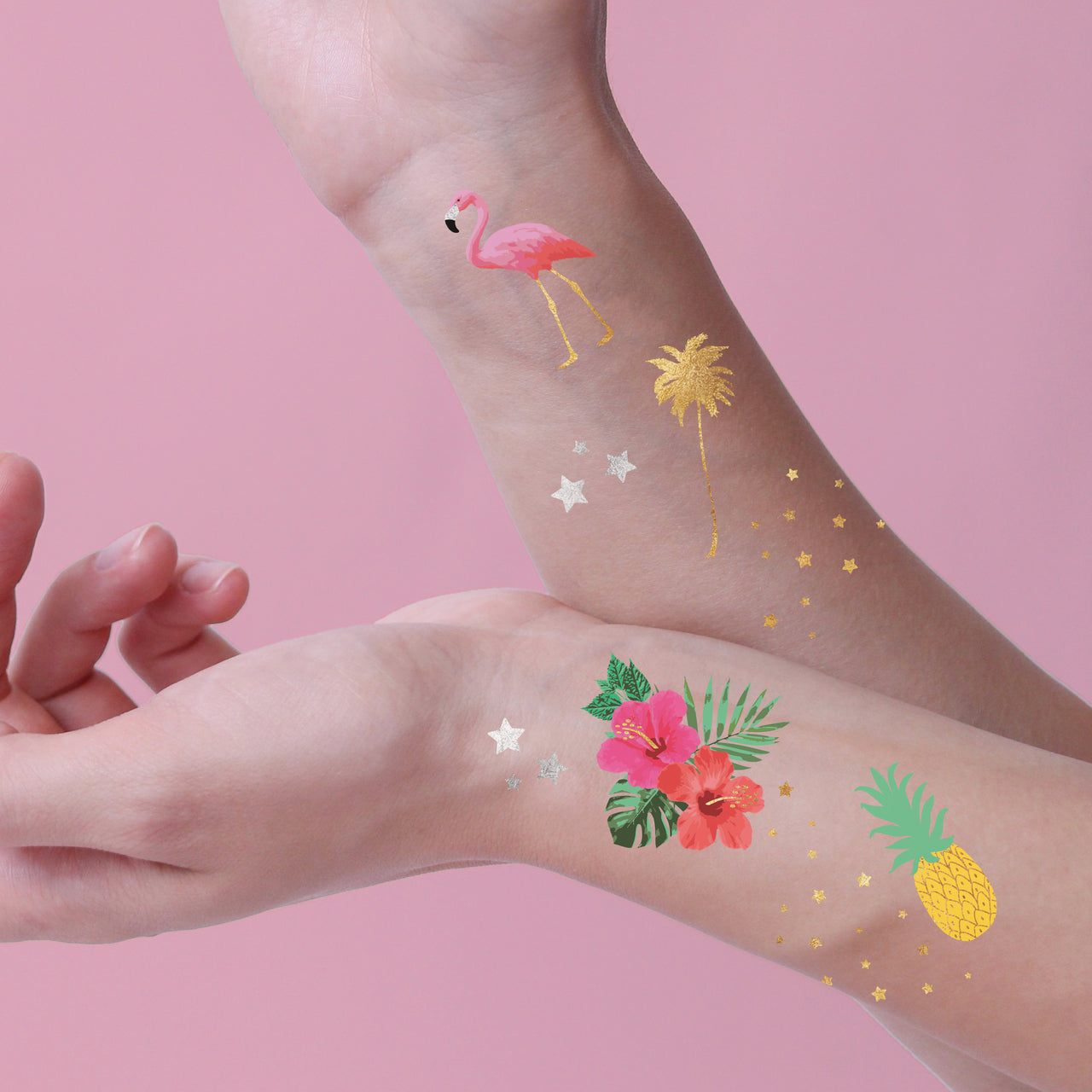 Sparkle all summer long in the Forever Summer tattoo bundle. Metallic temporary tropical tattoos: flamingo, pineapple, palm tree, hibiscus flower