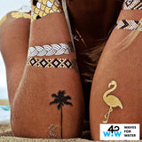 Flash Tattoos x Goldfish Kiss H2O collection by Rebekah Steen. Over 40 metallic gold, silver and black beachy designs like flamingos and palm trees!