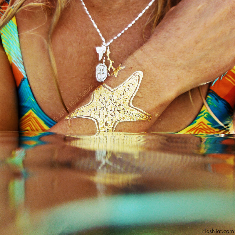 The Flash Tattoos x Goldfish Kiss H2O is a four sheet beachy inspired collection of metallic temporary tattoos - starfish, shark tooth necklace