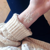 ‘WHITE FROST’ metallic gold and white snowflake Flash Tattoos. The perfect winter sparkle! #FLASHTAT @FlashTattoos