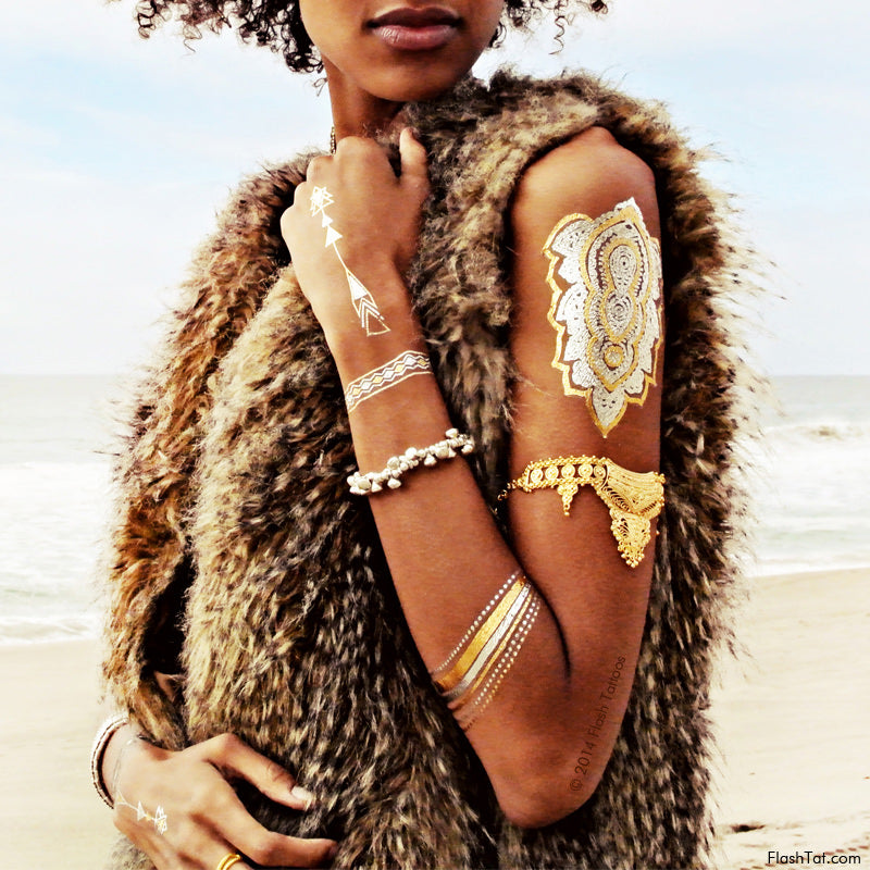 Pair the metallic gold and silver Child of Wild Flash Tattoos with bold jewelry for a glamorous look!